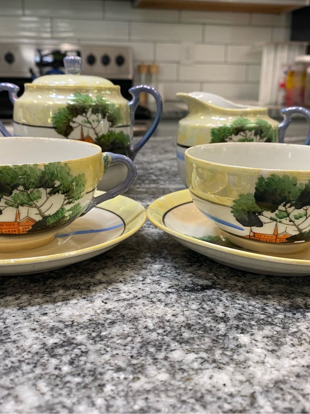 Beautiful vintage Japanese lusterware sugar, creamer & 2 two tea cups & saucers